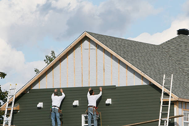 Professional Siding technician working in Gold Hill, OR